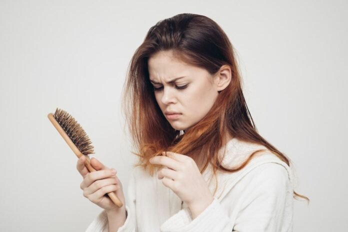 hair fall: be careful! If your hair is falling then stop this task today itself.
